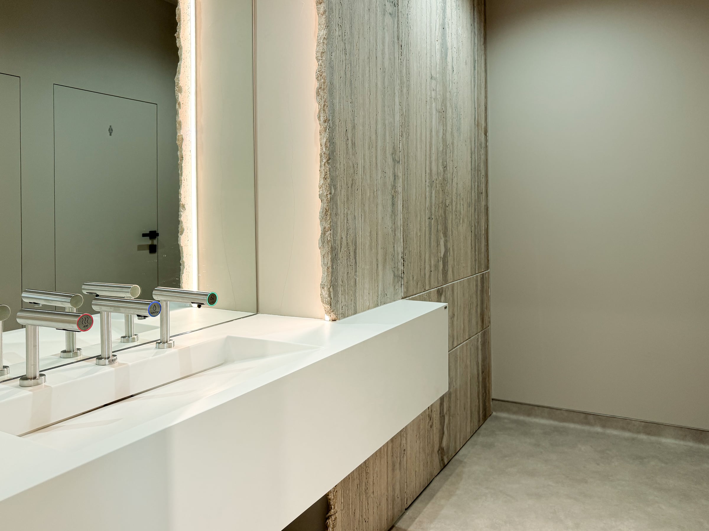 Modern bathroom with vanity and flush doors