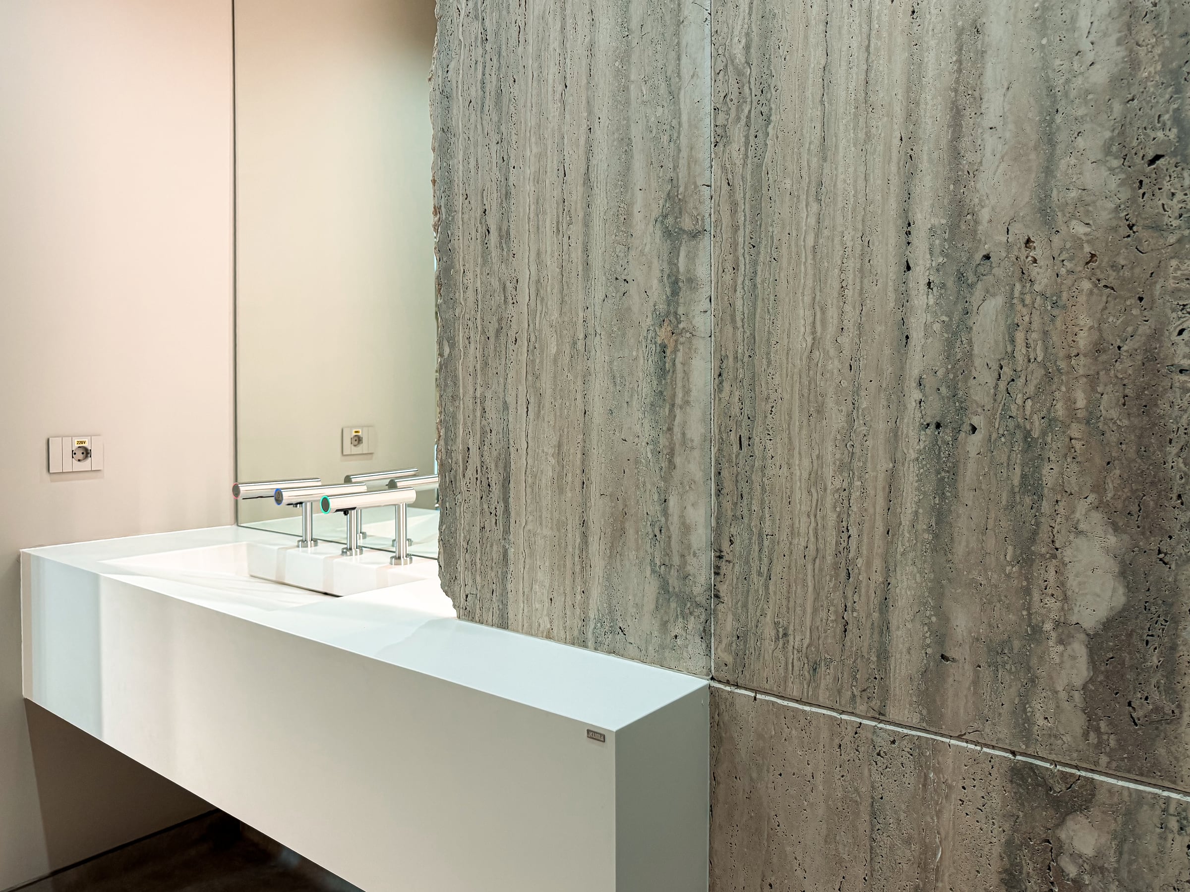 Travertine bathroom with vanity