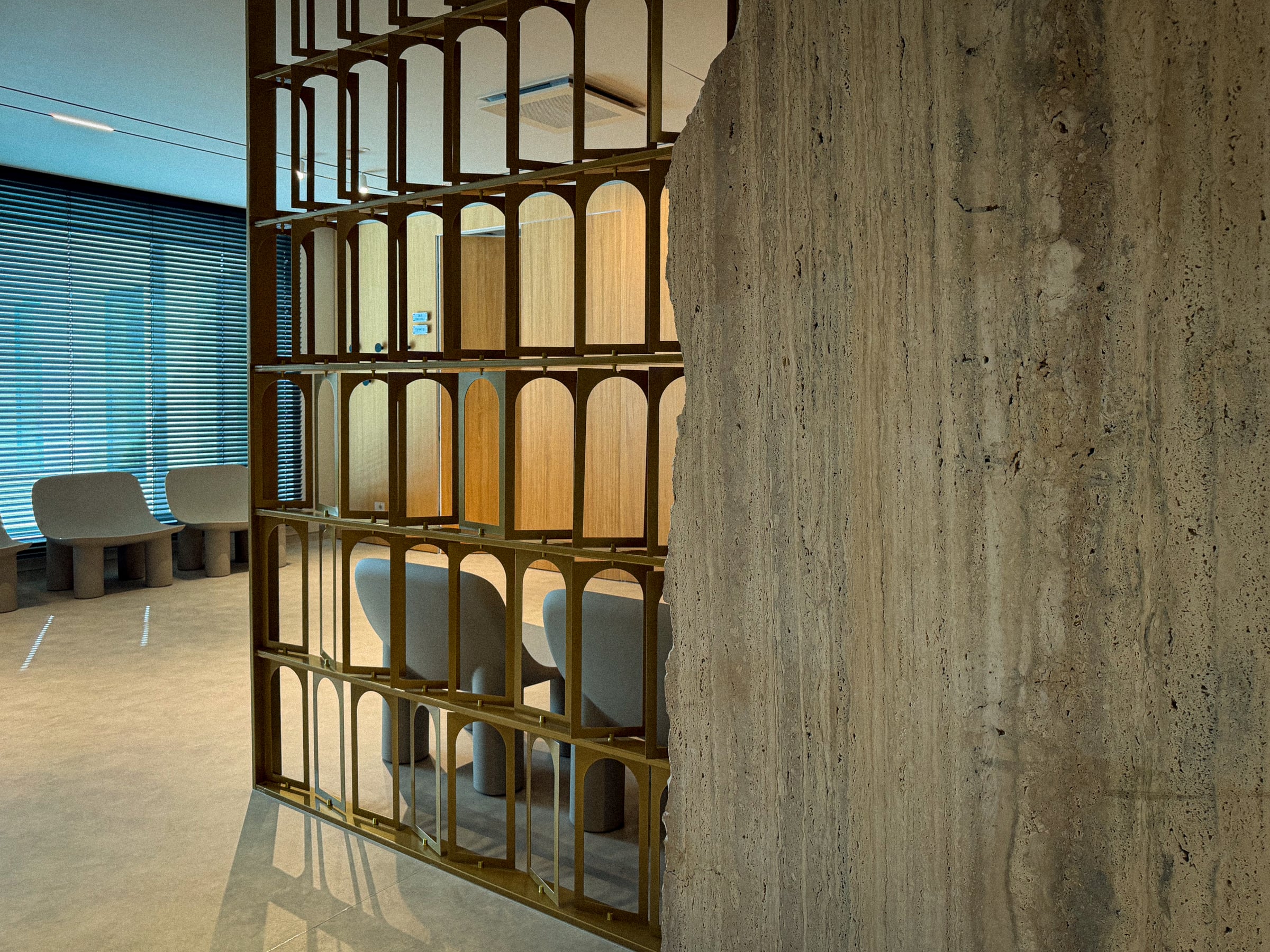 Decorative metal screen and stone finishes