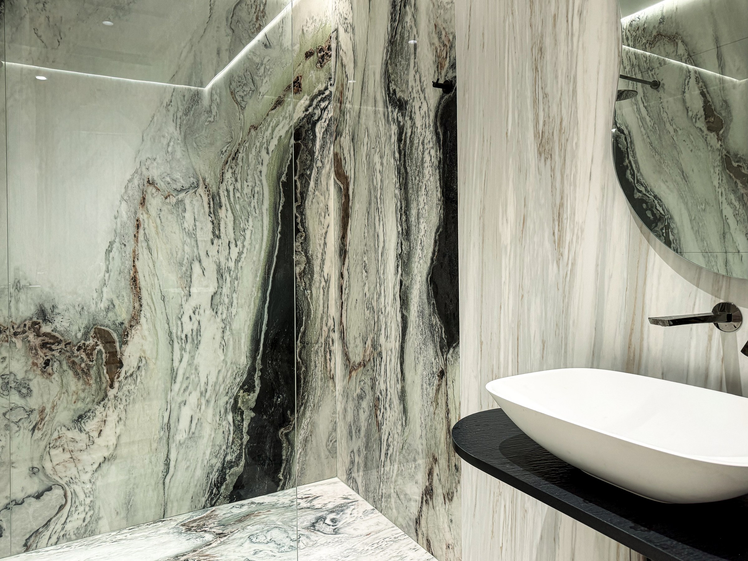 Residential House Cluj — Black and white granite bathroom