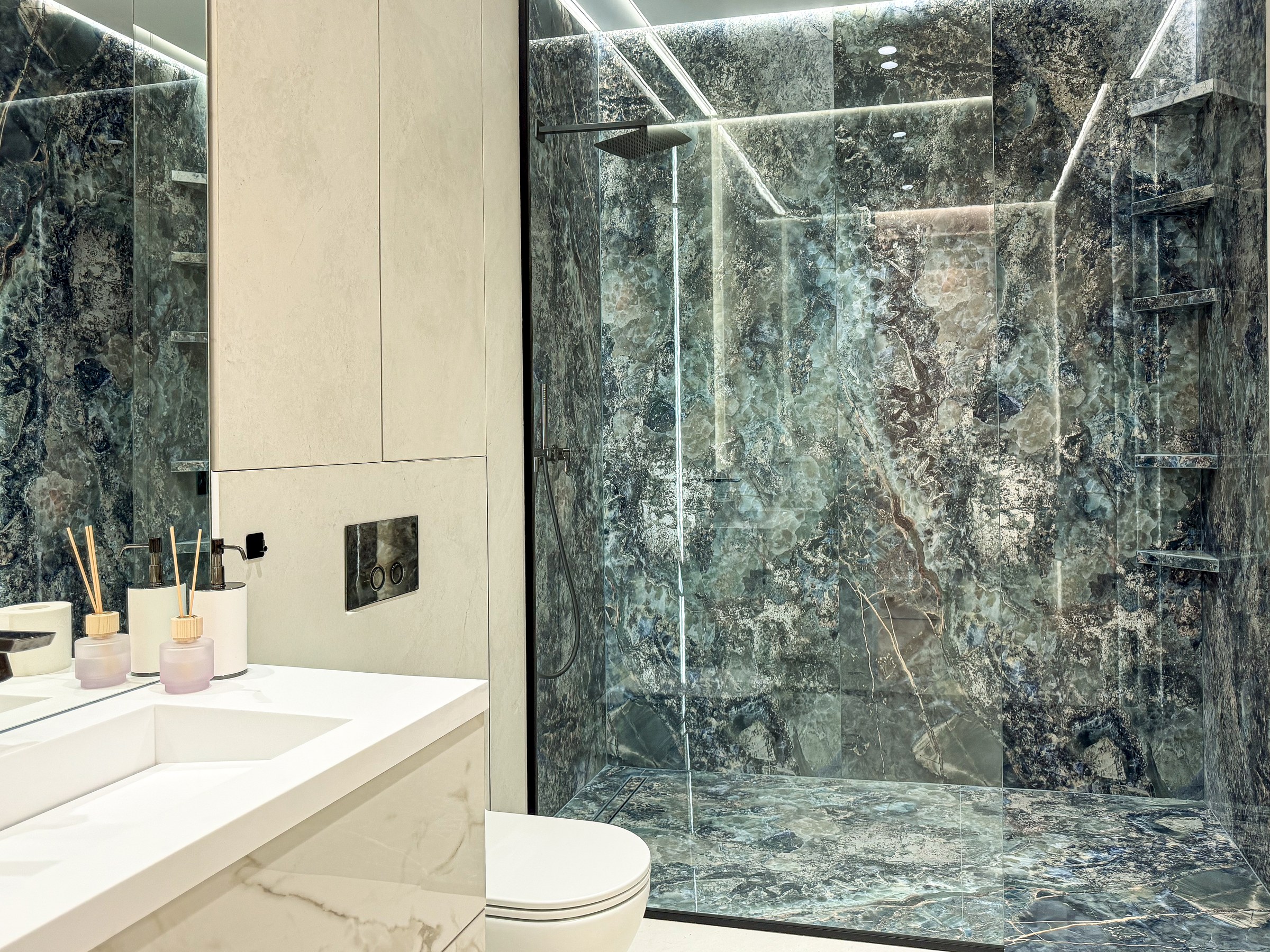 Residential House Cluj — Green granite and marble bathroom